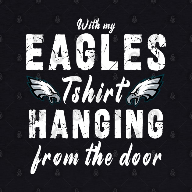 With My Eagles Tshirt Hanging From The Door by Ksarter